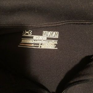 Black Under armour semi fitted long sleeve. Size medium